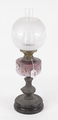 Lot 132 - A Victorian oil lamp, having an opalescent...