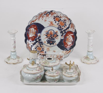 Lot 152 - A Limoges porcelain dressing table set to...