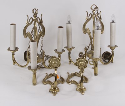 Lot 170 - A pair of Art Nouveau style brass three sconce...