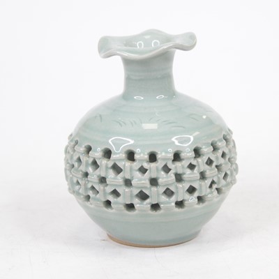 Lot 177 - A Chinese celadon glazed vase, of squat...