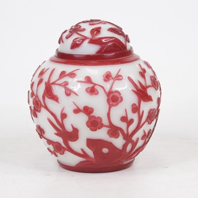 Lot 180 - A Peking glass jar and cover, of baluster form,...
