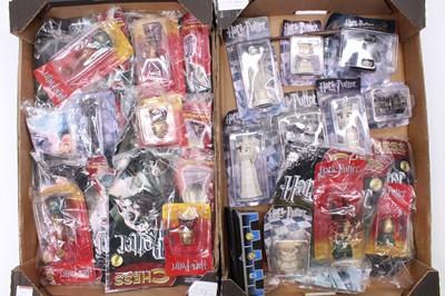 Lot 1562 - Two trays containing 20+ various Harry Potter...