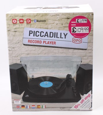 Lot 1576 - A boxed HMV Picadilly record player housed in...