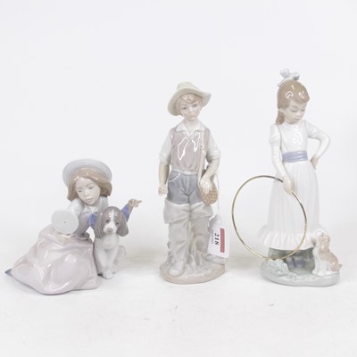 Lot 218 - A Lladro Spanish porcelain figure of a boy...