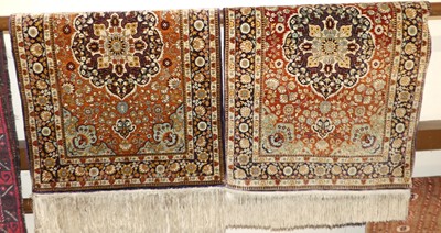 Lot 1147 - A pair of Chinese silk hall rugs, having...