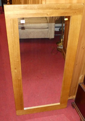 Lot 1163 - A contemporary rubber wood rectangular wall...