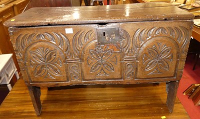 Lot 1173 - An antique relief carved oak boarded six-plank...