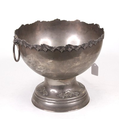 Lot 237 - A large plated punch bowl the rim cast with...