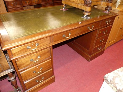 Lot 1183 - A 20th century mahogany and gilt tooled green...