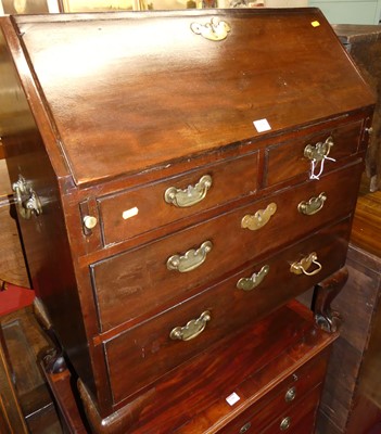 Lot 1205 - An 18th century mahogany campaign bureau, the...