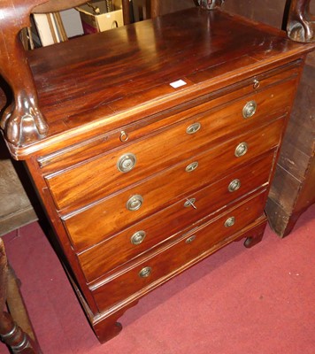 Lot 1206 - A 19th century mahogany chest, of four long...