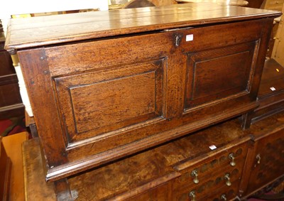 Lot 1233 - An 18th century joined oak hinge topped twin...