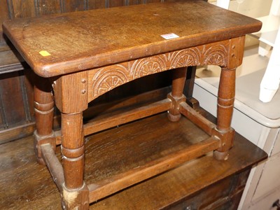 Lot 1240 - A joined oak and chip carved joint stool,...