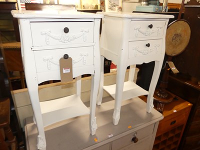 Lot 1242 - A pair of contemporary French style white...