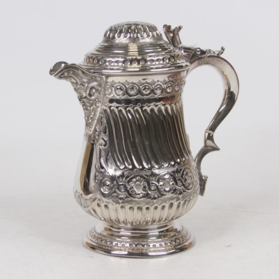 Lot 251 - A 19th century silver plated jug, the domed...