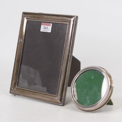 Lot 262 - A sterling silver clad easel photograph frame,...