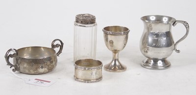 Lot 276 - A modern silver porringer, having C-scroll...