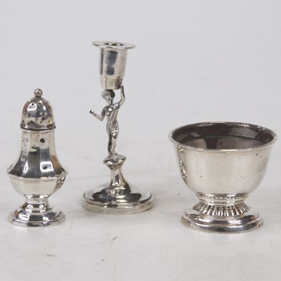 Lot 280 - An Edwardian silver novelty taperstick, the...