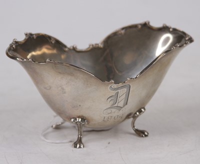 Lot 282 - An early 20th century sterling silver sugar...