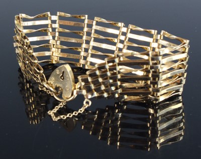 Lot 346 - A modern 9ct gold gatelink bracelet, with...