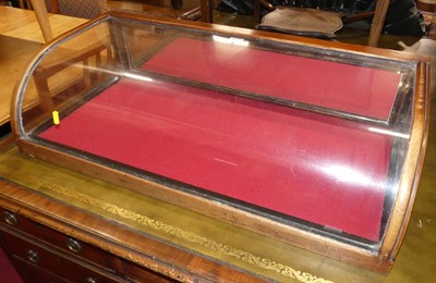 Lot 1257 - A circa 1900 mahogany and glazed and bowed...