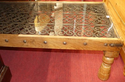 Lot 1258 - A contemporary Eastern teak and wrought iron...