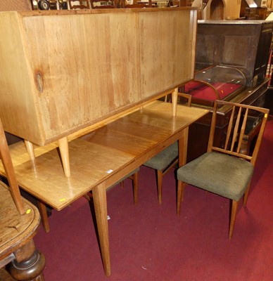 Lot 1259 - A 1960s teak dining suite by Gordon Russell,...