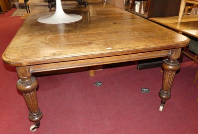 Lot 1261 - A late Victorian oak round cornered extending...