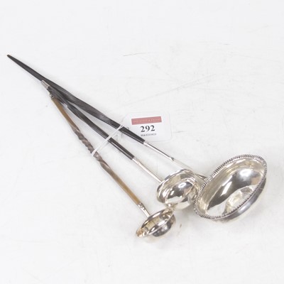 Lot 292 - A George III silver toddy ladle, of oval form...