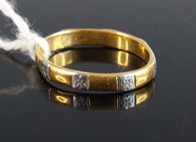 Lot 349 - A 22ct gold and platinum wedding band, 2.6g...