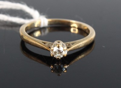 Lot 357 - A 9ct gold diamond solitaire ring, the claw...