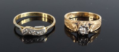 Lot 360 - A modern 9ct gold diamond solitaire ring, the...