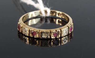 Lot 368 - A modern 9ct gold ruby and diamond point 7...