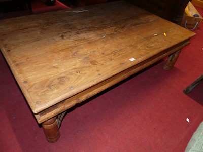 Lot 1265 - A contemporary Eastern teak and iron bound low...