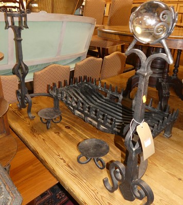 Lot 1267 - A pair of wrought iron fire dogs in the Gothic...