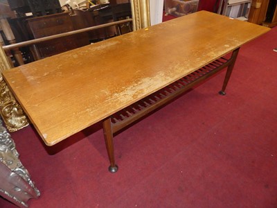 Lot 1269 - A 1960s teak long coffee table, having a...