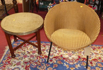 Lot 1274 - A Lloyd Loom gilt painted wicker tub chair on...
