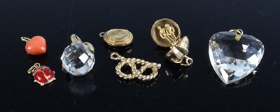 Lot 405 - A 9ct gold charm in the form of an apple,...