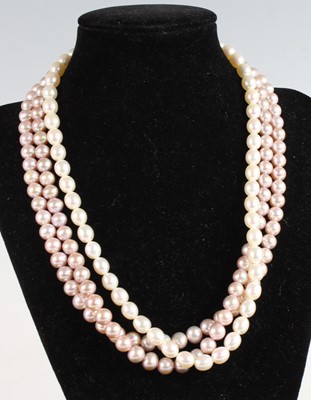 Lot 421 - A dyed and cultured pearl single knotted...
