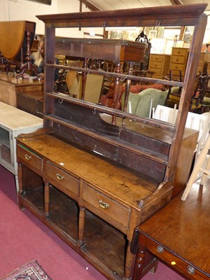 Lot 1335 - An 18th century provincial oak dresser, having...