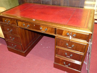 Lot 1343 - A reproduction mahogany gilt tooled red...