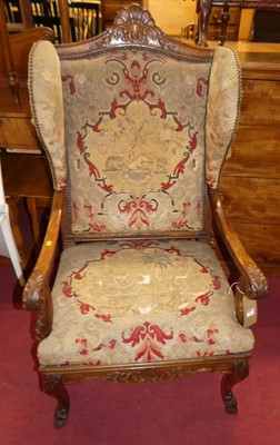 Lot 1304 - An early 20th century Italian floral carved...
