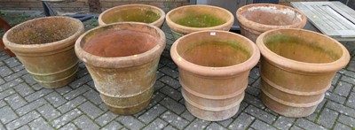 Lot 1366 - A collection of seven similar large terracotta...
