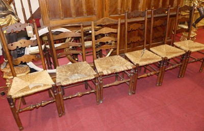 Lot 1316 - A set of four early 20th century oak pierced...