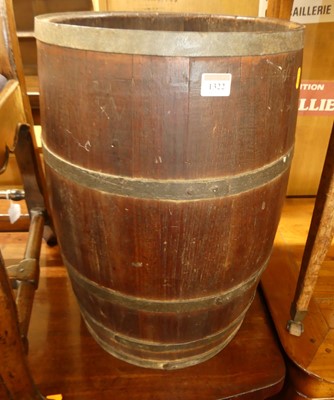 Lot 1322 - An early 20th century coopered oak stick stand,...