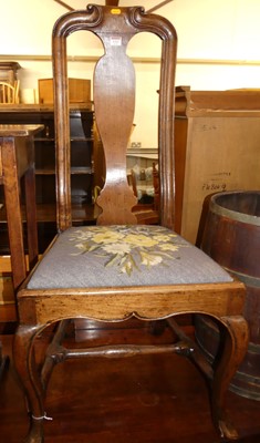Lot 1323 - An 18th century provincial walnut single splat...