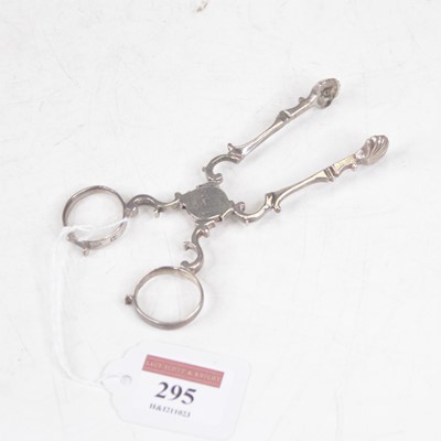 Lot 295 - A pair of George III white metal sugar tongs,...