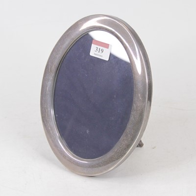 Lot 319 - A modern Carrs silver clad easel photograph...