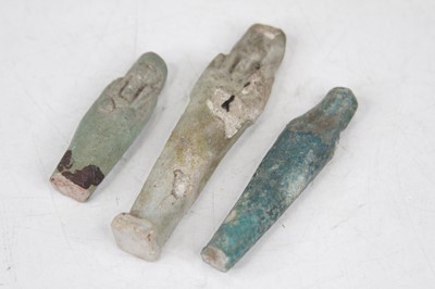 Lot 506 - An Egyptian blue faience shabti figure, carved...