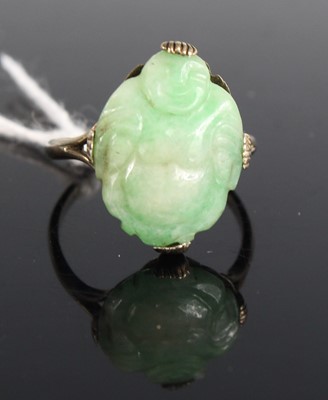 Lot 438 - A Chinese white metal and jade tablet ring,...